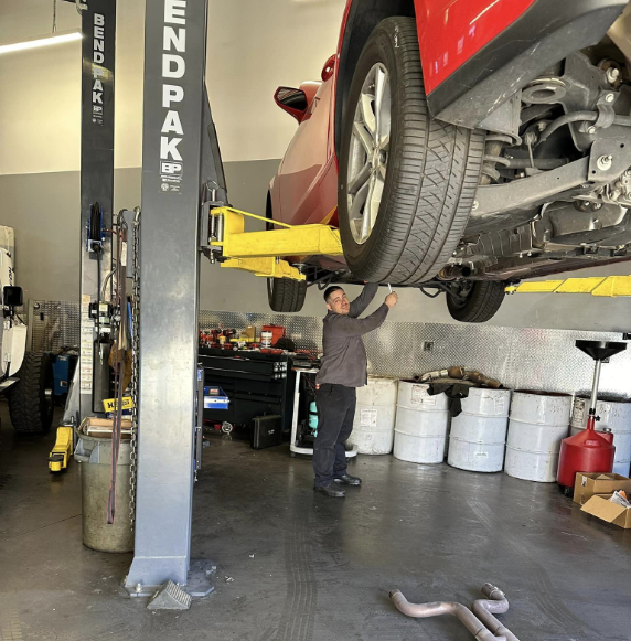 Car getting maintenance by mechanic